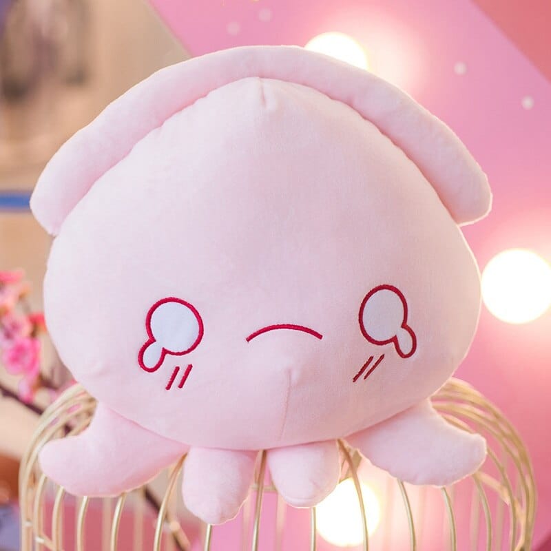 Peluche pieuvre rose expressive